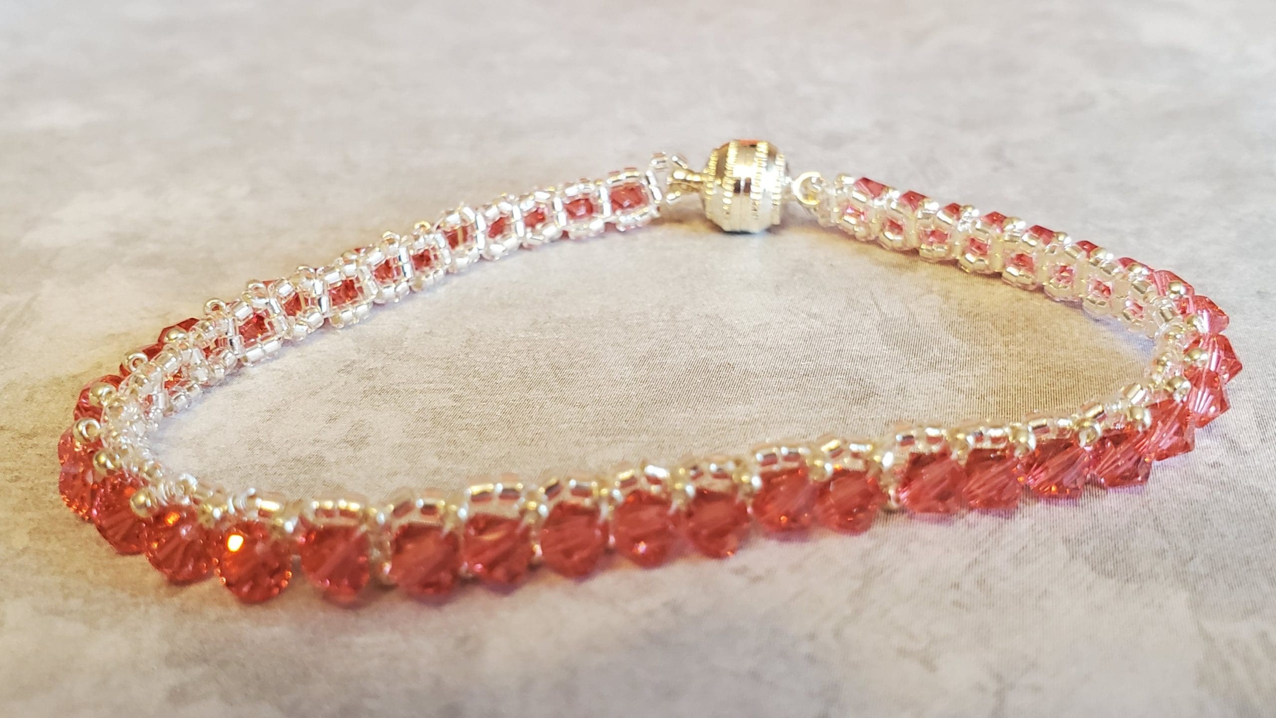 Featured image for “Padparadscha Tennis Bracelet”